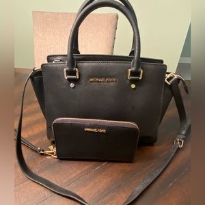 Michael Kors small black satchel with black zip wallet/cellphone holder